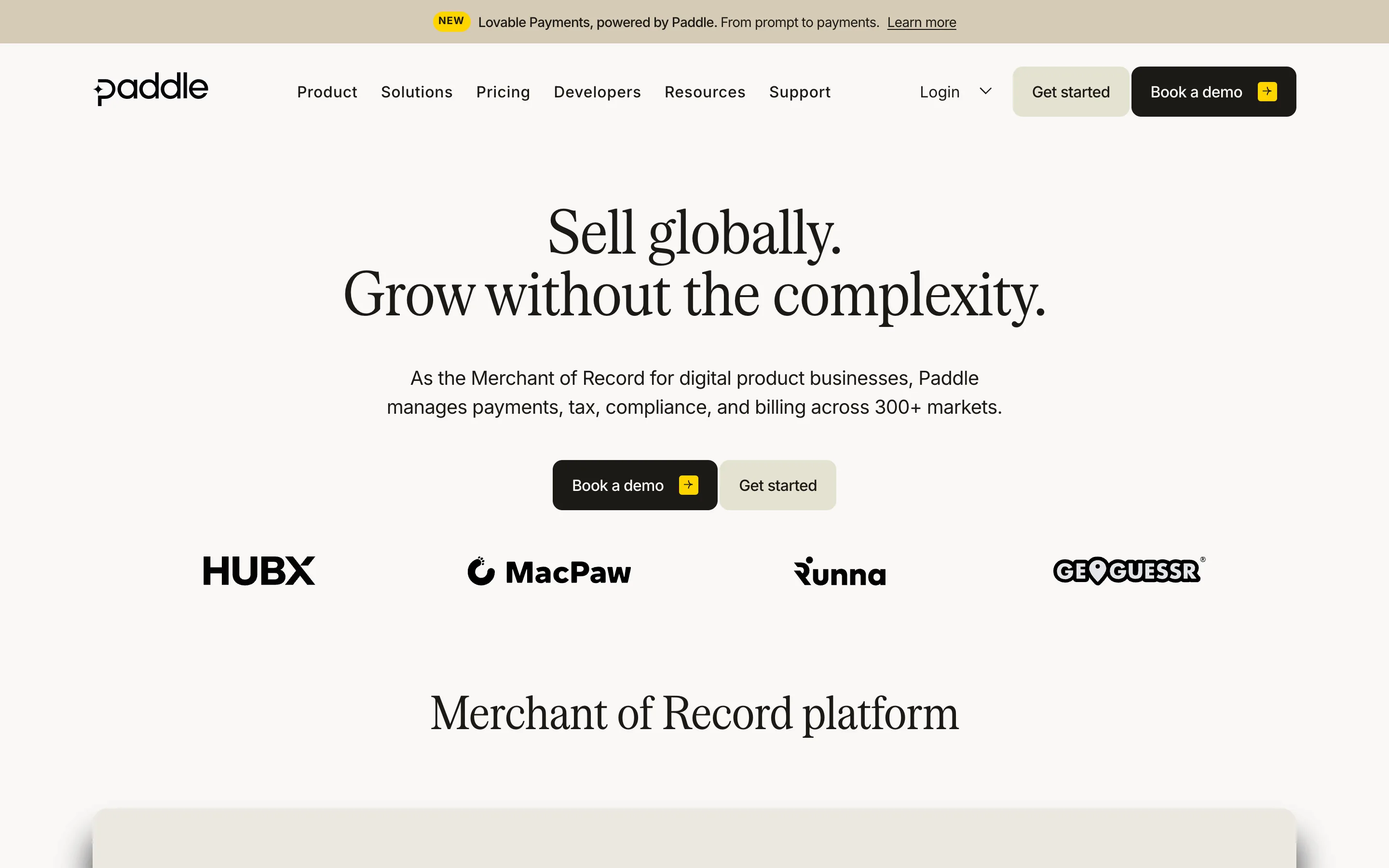 Paddle homepage stating "Sell globally. Grow without the complexity." and describing itself as the Merchant of Record for digital product businesses managing payments, tax, compliance and billing across 300+ markets