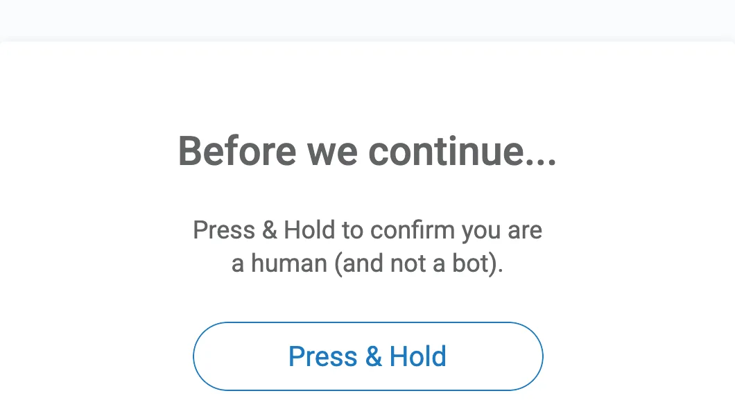 HUMAN Security's bot challenge page reading "Before we continue... Press and Hold to confirm you are a human (and not a bot)" with a Press and Hold button and a reference ID