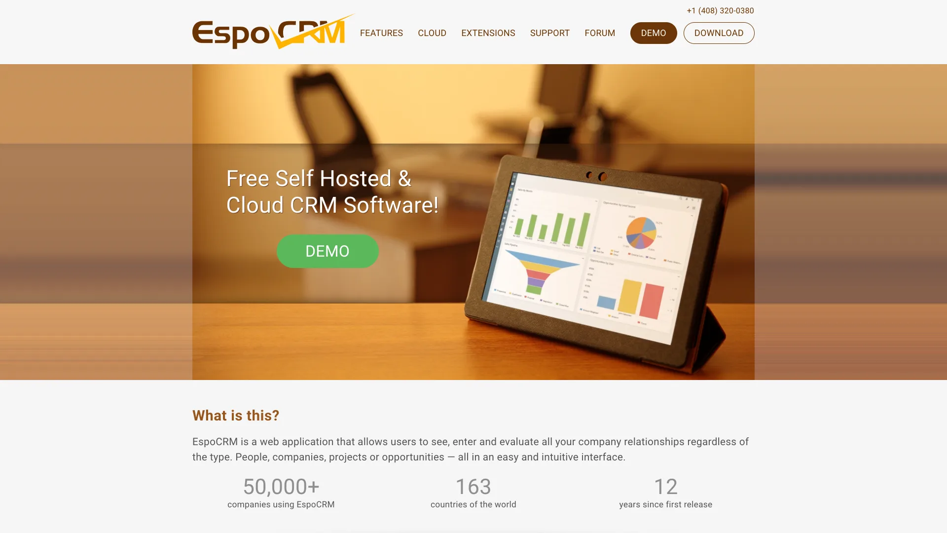 EspoCRM's homepage headline "Free Self Hosted & Cloud CRM Software!" with a Demo button over a tablet showing sales funnel and bar charts