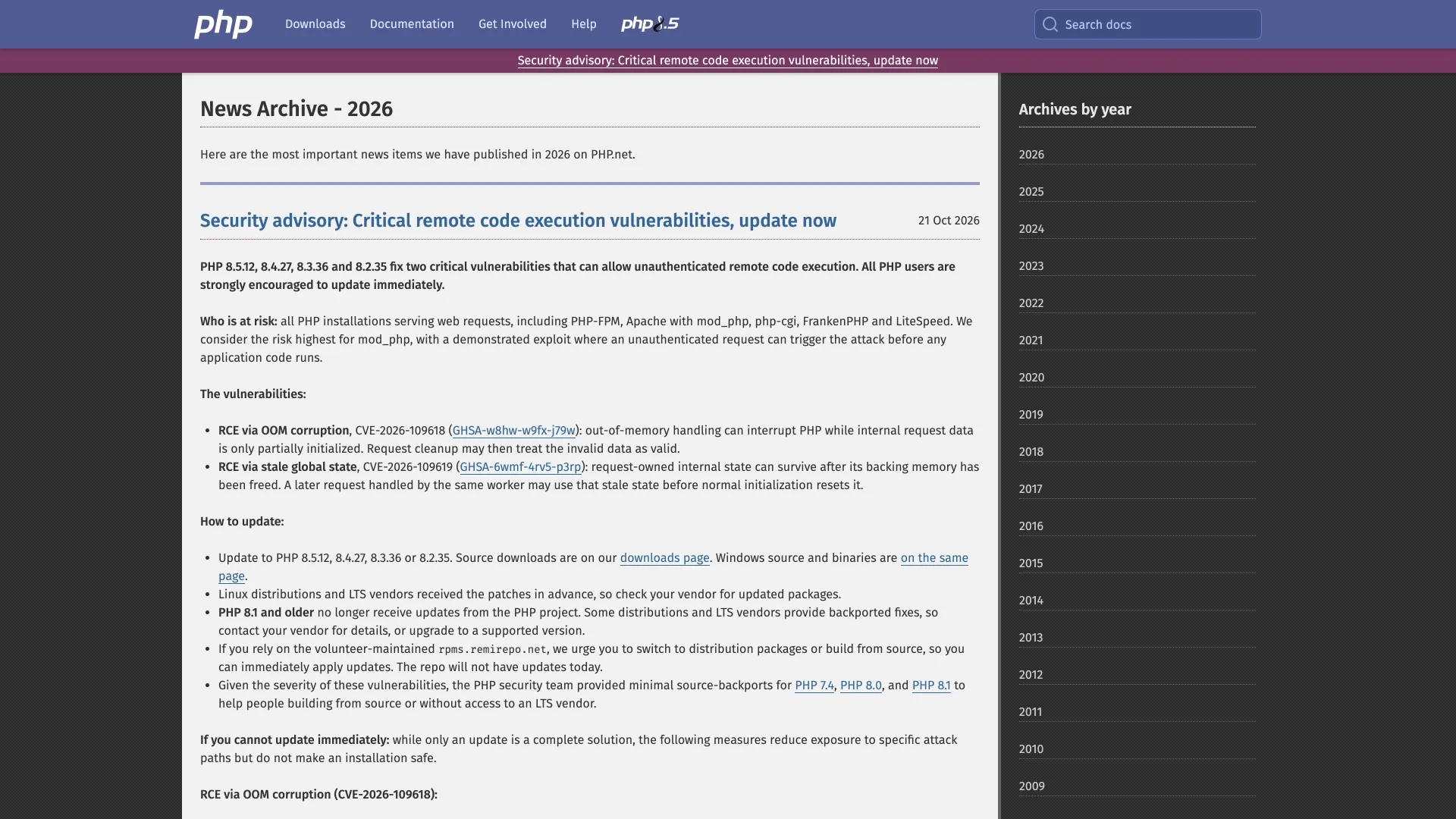 The php.net news archive showing the October 21, 2026 security advisory, the four fixed releases and the two CVEs